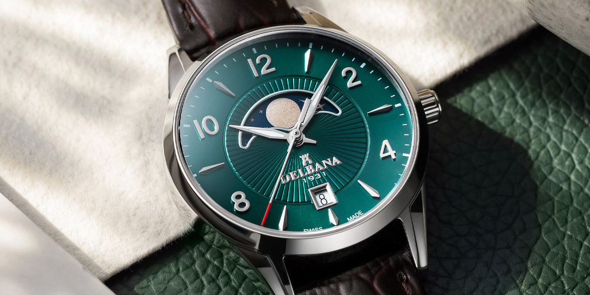 Delbana Lunetta stainless steel moonphase watch with deep teal dial and brown leather strap in context