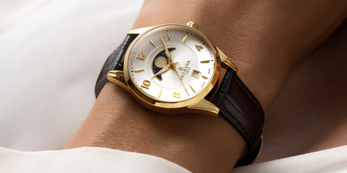 Delbana Lunetta stainless steel with yellow gold PVD moonphase watch with silver dial and brown leather strap